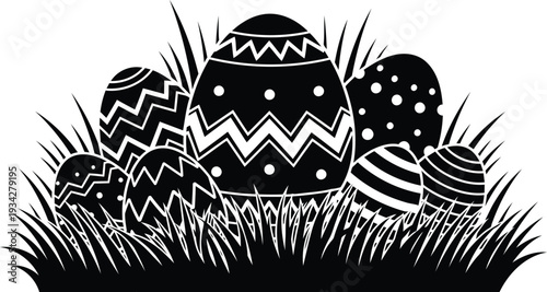 Black and white Easter eggs in grass