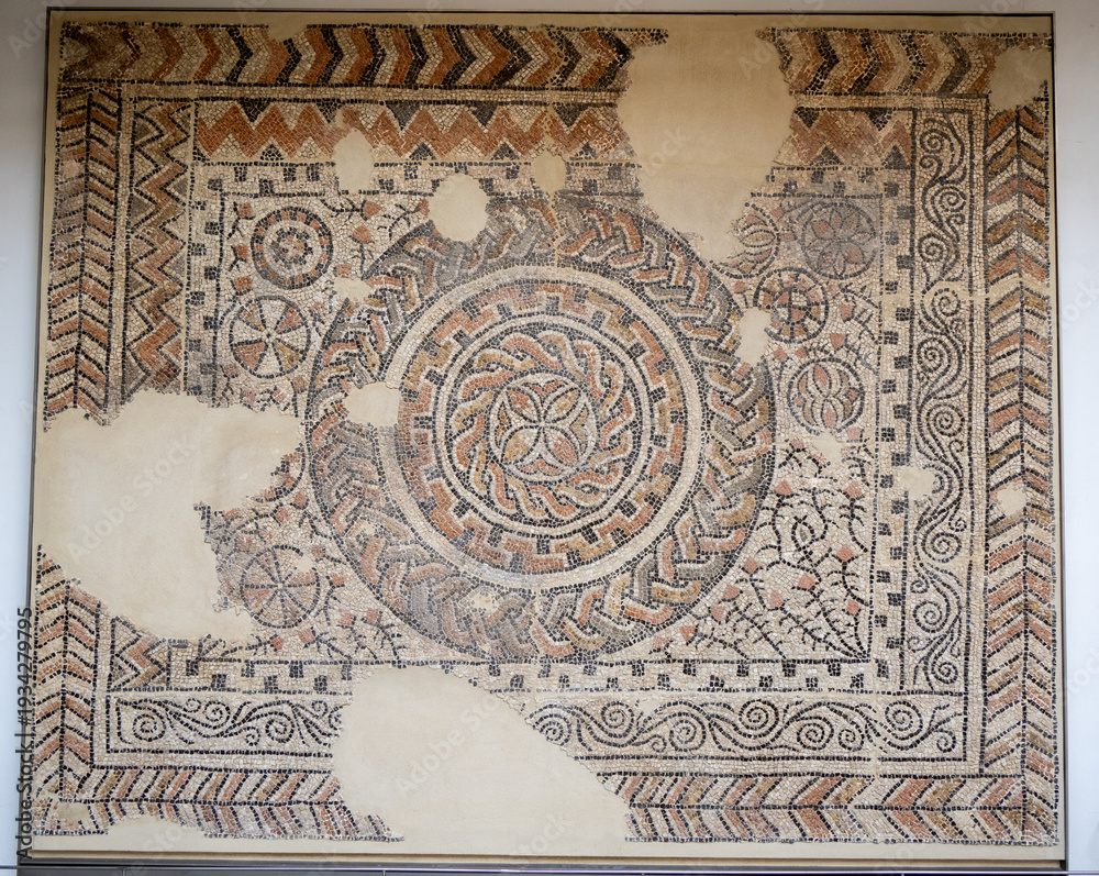 Obraz premium Granada, Spain - 19 Dec 23: Roman mosaic floor panel with geometric border, Granada museum