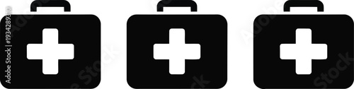 Three black first aid kits with white cross symbols arranged in a row.