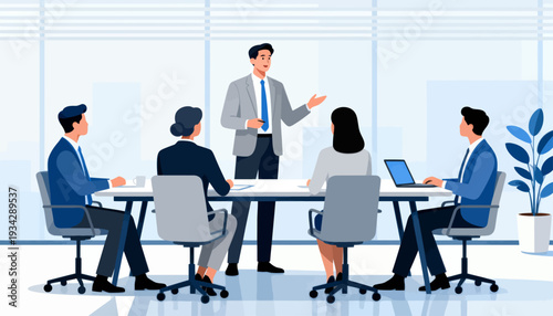 Professional team gathers around a central presenter. Everyone focuses intently on the speaker's message. Subtle gestures suggest active engagement and collaboration