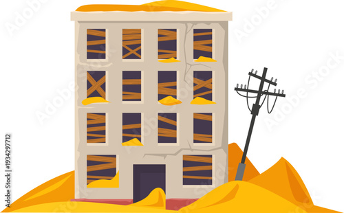 Abandoned building ravaged by sand and collapse