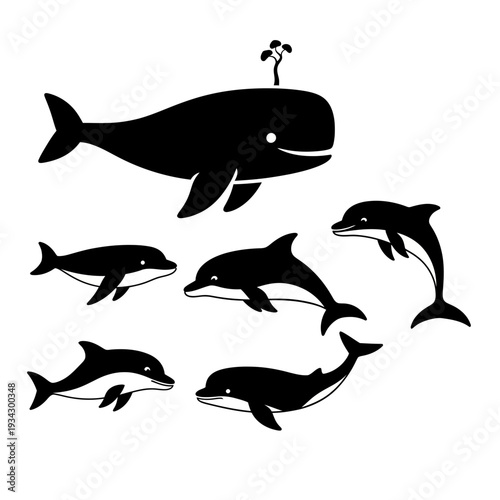 A whale and dolphins swim together in the ocean