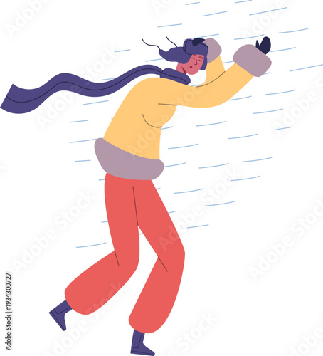 Person struggling against strong winter wind outside