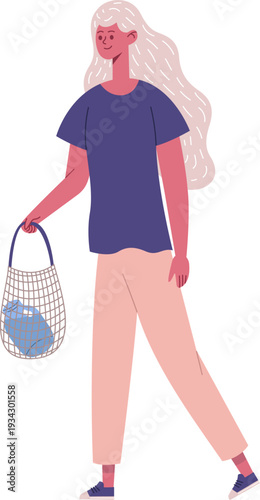 Woman walking carrying reusable net shopping bag