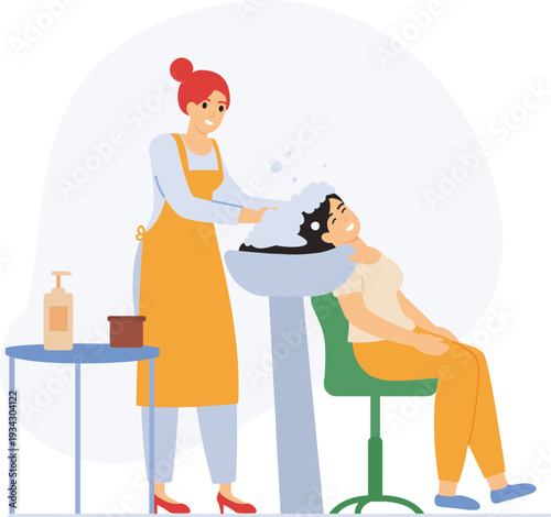 Hairdresser washing client hair at beauty salon