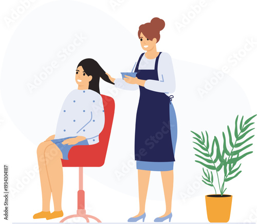 Hairdresser applying treatment to client's hair in salon