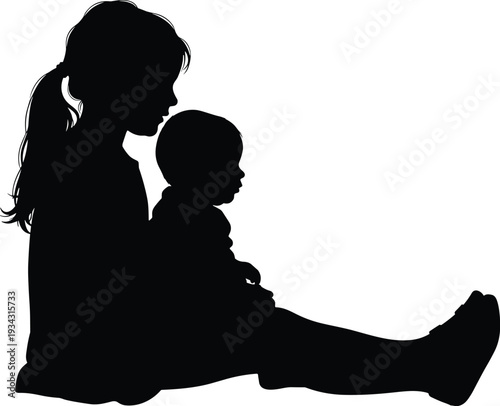 Black silhouette of woman sitting with baby