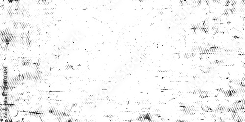 Abstract grunge background featuring a black ink splat pattern on a rough textured vintage wall with wet paint drops and dirt dust surface