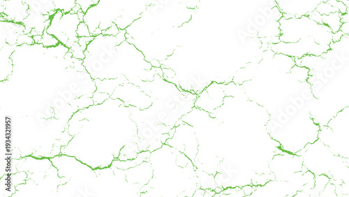 Green cracks on white surface forming intricate patterns and shapes