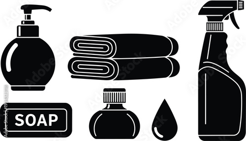 Minimalist black cleaning supplies icons close up soap dispenser spray bottle folded towels bar soap liquid bottle water drop on white background flat composition studio lighting