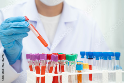 Photos Scientist medical professional use test tube for research in science laboratory