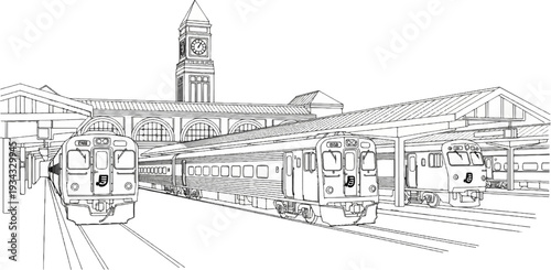 Train station with trains at platforms under a clock tower