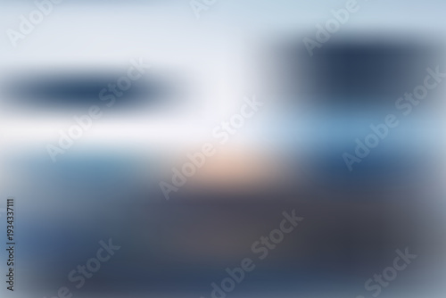 Blurry abstract background with shades of blue and white gradient