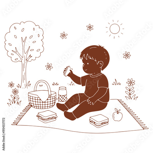 Young child enjoying a picnic on a blanket in a park surrounded by flowers and trees on a sunny day