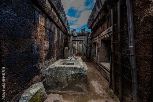 Tablou pe pânză Ancient stone corridor and altar in Prasat Neang Khmau temple ruins