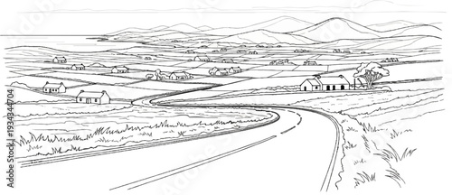 Winding country road curves through rolling hills with scattered houses and distant mountains