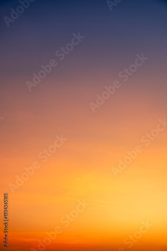 Beautiful luxury soft gradient with orange gold clouds and sunlight on the blue sky perfect for the background, take in everning,morning,Twilight, high definition landscape photo, Vertical