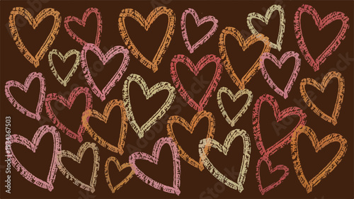 Various heart shapes in assorted colors on a brown background