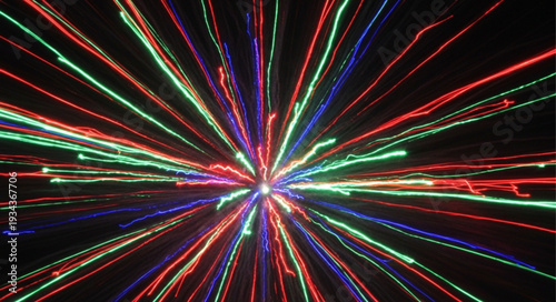Abstract explosion of colorful laser light beams radiating from center.
