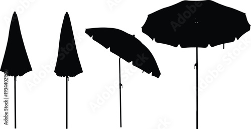 Black silhouettes of closed and open umbrellas on poles