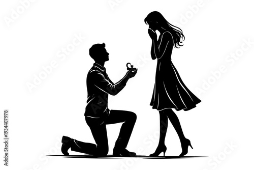 Silhouette of romantic marriage proposal with engaged couple.