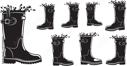 Black rubber boots with water splashes isolated on white