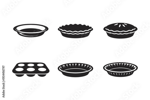 Collection of baking dishes including pie pans and muffin tin, isolated on white background