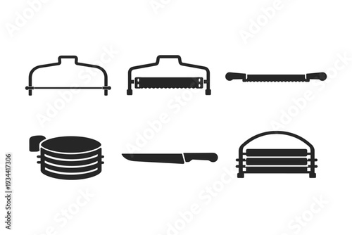 Collection of kitchen and butchery tools including saws, knives, and slicers