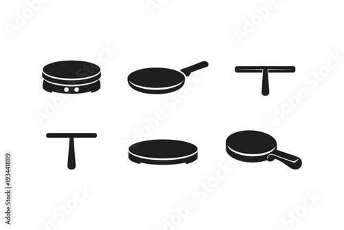 Collection of black icons representing crepe makers, pans, and spreaders on a white background