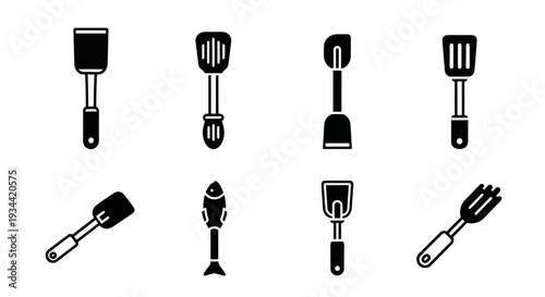 Collection of kitchen spatulas and cooking utensils, diverse styles and designs for culinary use