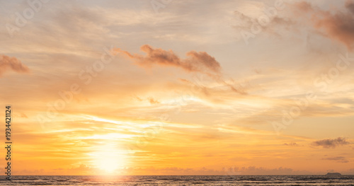 Sunset Sky clouds beautiful Sea in the evening summer season Background, Yellow warm sun dawn,Orange sunrise golden hour, Landscape horizon Colorful nature sun light sea sky cloud,Dusk Sky background