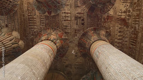 Egypt. Esna temple hypostyle hall with massive painted columns and colorful hieroglyphic reliefs on ceiling in Egypt, ancient Roman-era architecture with preserved pigments and carvings.