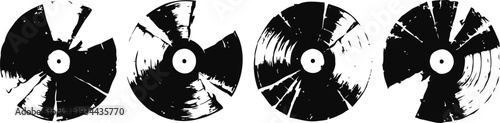 Four black vinyl records with scratched, worn surfaces on white background, music nostalgia theme