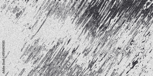 Grungy black and white abstract texture with diagonal streaks of dark ink splatters and fine grain noise creating a distressed and artistic background effect