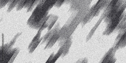 Dynamic monochrome abstract background with blurred diagonal streaks of dark charcoal against a speckled white noise texture creating a sense of motion and depth