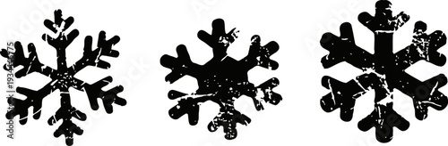 black snowflakes silhouettes set with distinct intricate shapes on white background symbolizing winter and cold weather
