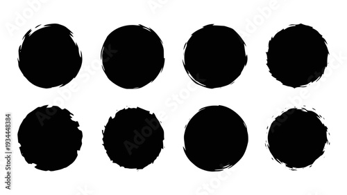Vector illustration of set of eight black grunge ink brush stroke circles or dots on a transparent background