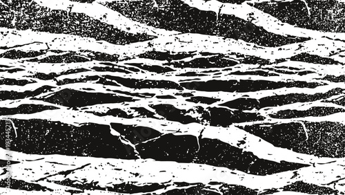 Abstract black and white cracked surface texture with waves and rugged pattern design