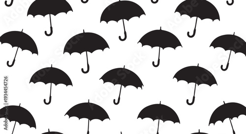 Black umbrellas on white background in repeating pattern design