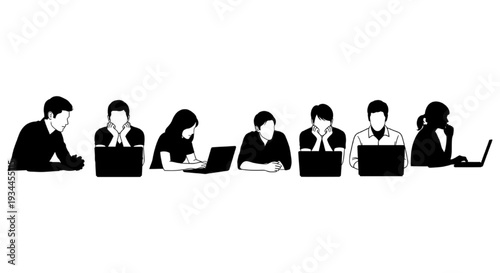 People working on laptops, group of diverse individuals focused on their screens