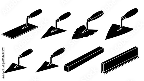 Various trowels and tools arranged neatly on surface
