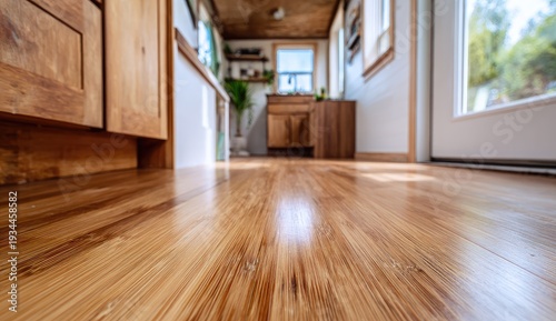 Warm Wooden Floor Reflecting Sunlight in a Cozy Tiny House Interior.