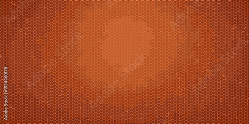 Abstract background featuring a dense pattern of orange hexagonal cells