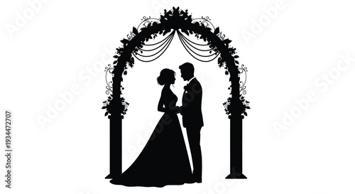 Couple embracing under a floral archway a romantic wedding scene silhouette