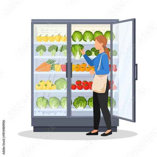 Woman choosing fresh vegetables from a refrigerator in a grocery store