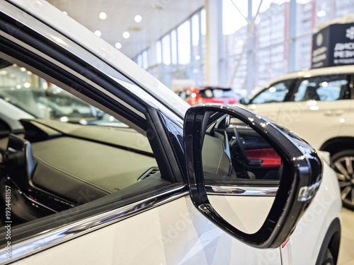 Car in modern car dealership showroom, professional automotive retail and buying concept.