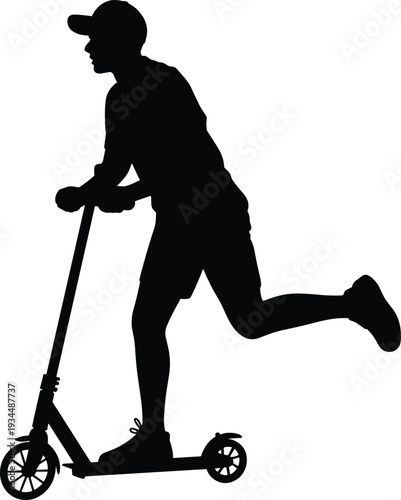 Black silhouette of a young male rider on a kick scooter for urban transportation eco friendly commuting active youth lifestyle and outdoor physical fitness concepts.