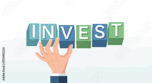Hand placing the last letter block to spell INVEST, symbolizing investment and financial growth.