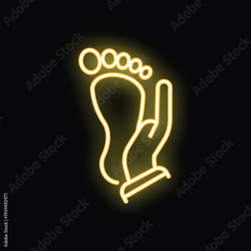 Glowing neon icon of a hand touching a foot, representing concepts like reflexology, massage and alternative medicine