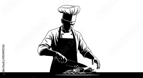 Chef preparing fish in kitchen.